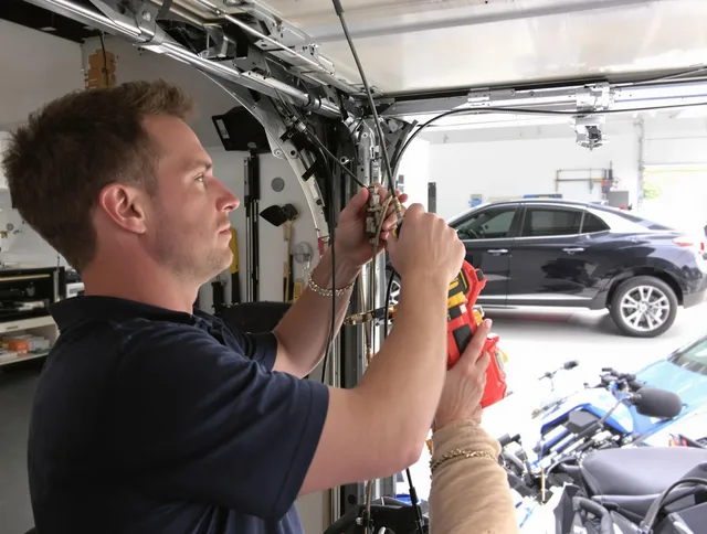 Altadena Garage Door Repair safety certified technician performing cable replacement in Altadena