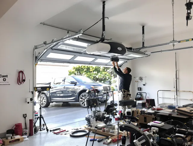 Altadena Garage Door Repair specialist installing smart garage door opener system in Altadena home