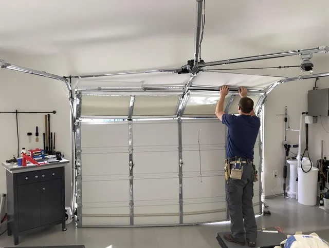 Altadena Garage Door Repair specialist performing precise section replacement on Altadena garage door