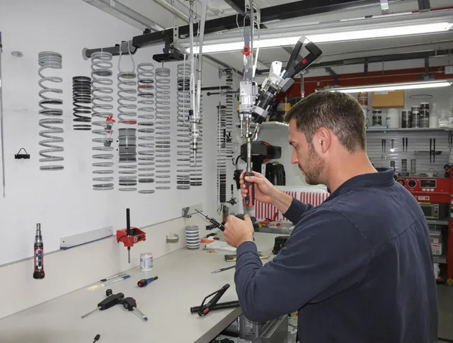 Altadena Garage Door Repair safety certified technician performing precision spring replacement in Altadena